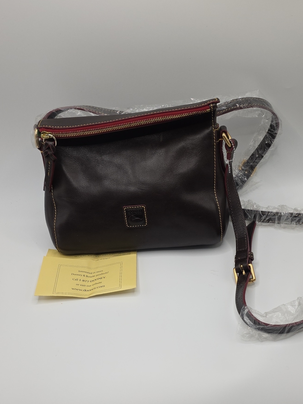 Dooney & Bourke Laurel Dark Brown Leather Crossbody with Red Zip Accent